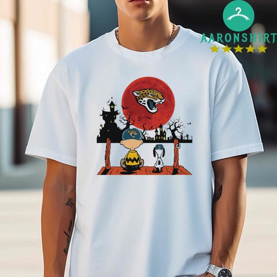 Charlie Brown And Snoopy Watching Jacksonville Jaguars Halloween 2024 Shirt